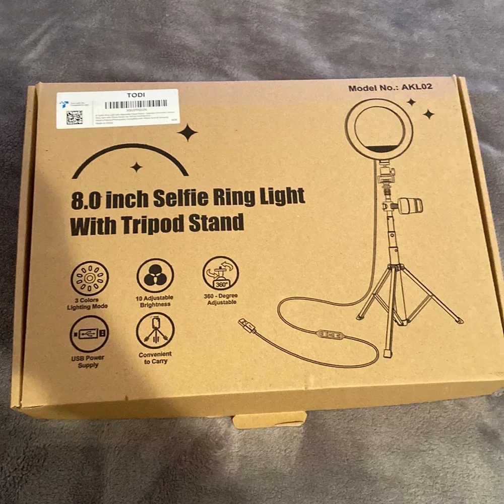 Brand new selfie ring , never used it